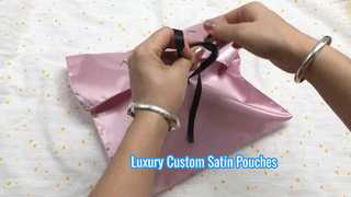 pink satin envelope pouch with bow