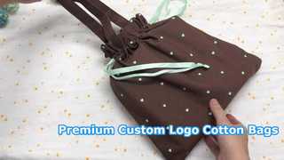 brown canvas drawstring pouch with handle